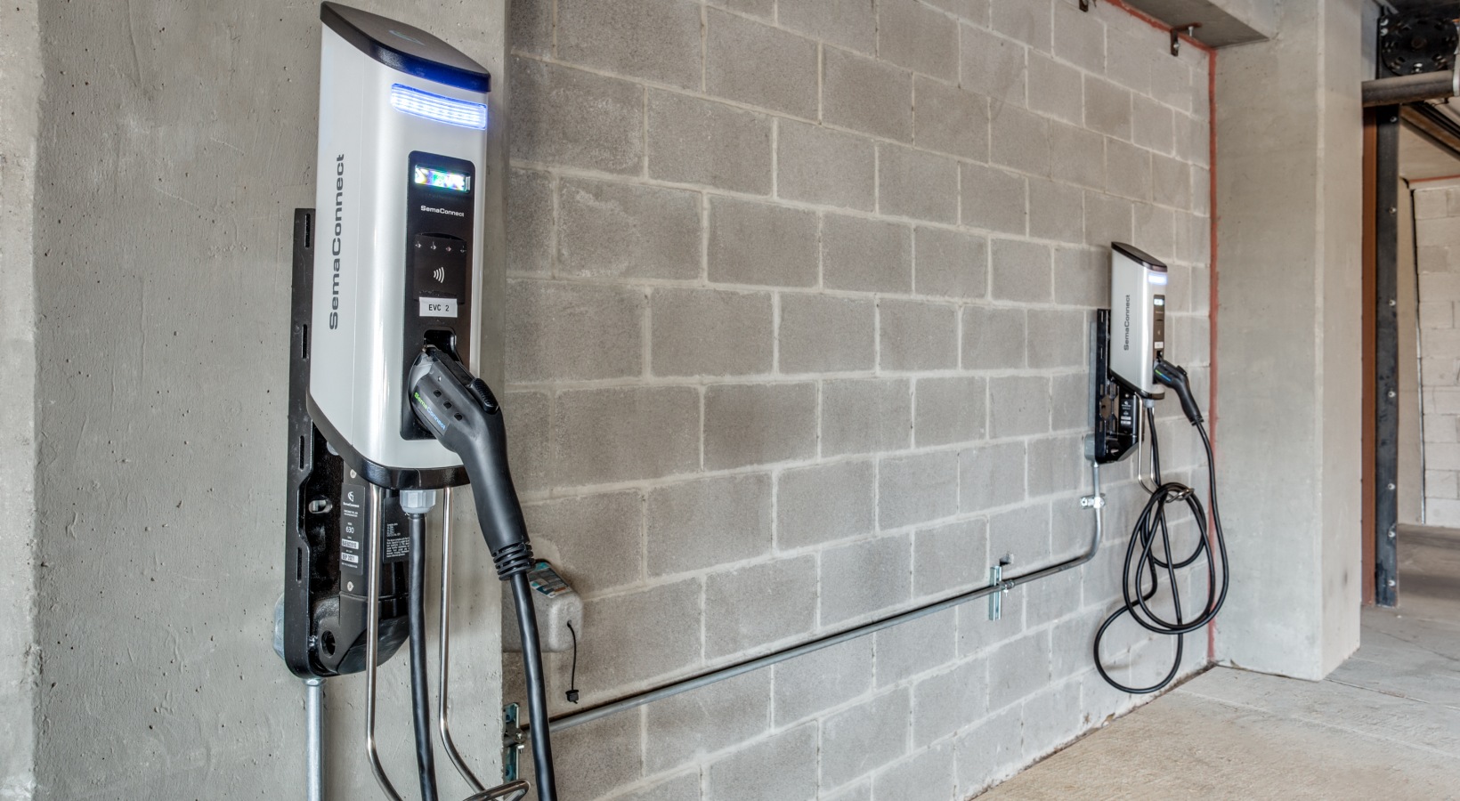 an electric vehicle charging station in a building at The  Franklin at Samuels Ave